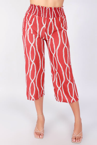 Jeans Warehouse Hawaii - PRINT WOVEN CAPRI'S - LEI MOMI SMOCKED CAPRI PANTS | By LUZ