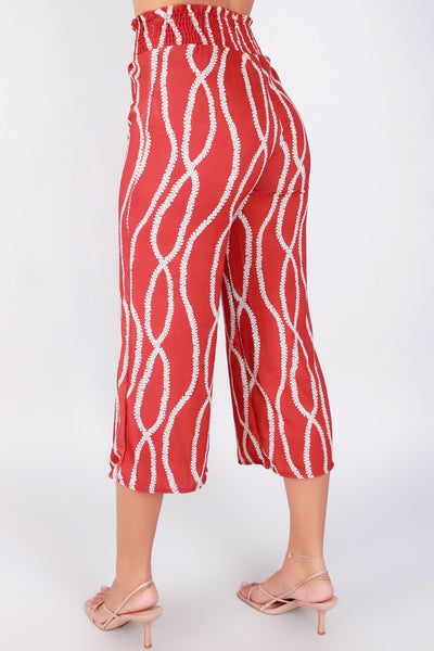 Jeans Warehouse Hawaii - PRINT WOVEN CAPRI'S - LEI MOMI SMOCKED CAPRI PANTS | By LUZ