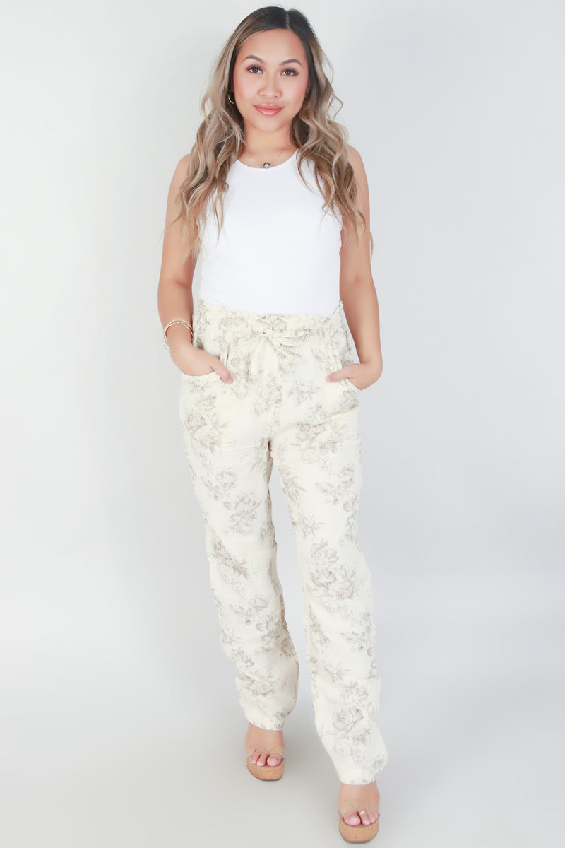 Jeans Warehouse Hawaii - PRINT WOVEN PANTS - FLORAL STRAIGHT LEG PANTS WITH POCKETS | By OLIVACEOUS