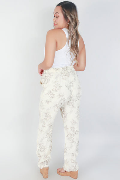 Jeans Warehouse Hawaii - PRINT WOVEN PANTS - FLORAL STRAIGHT LEG PANTS WITH POCKETS | By OLIVACEOUS